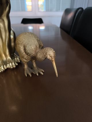 3 figuras animales doradas