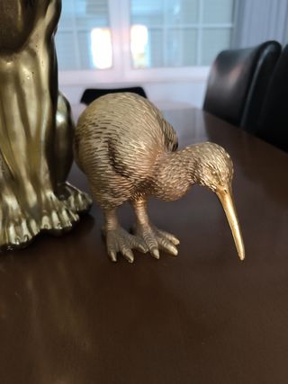 3 figuras animales doradas