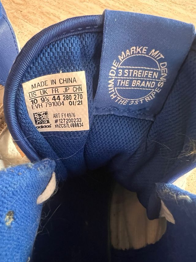 Zapatillas Adidas altas blancas y azules