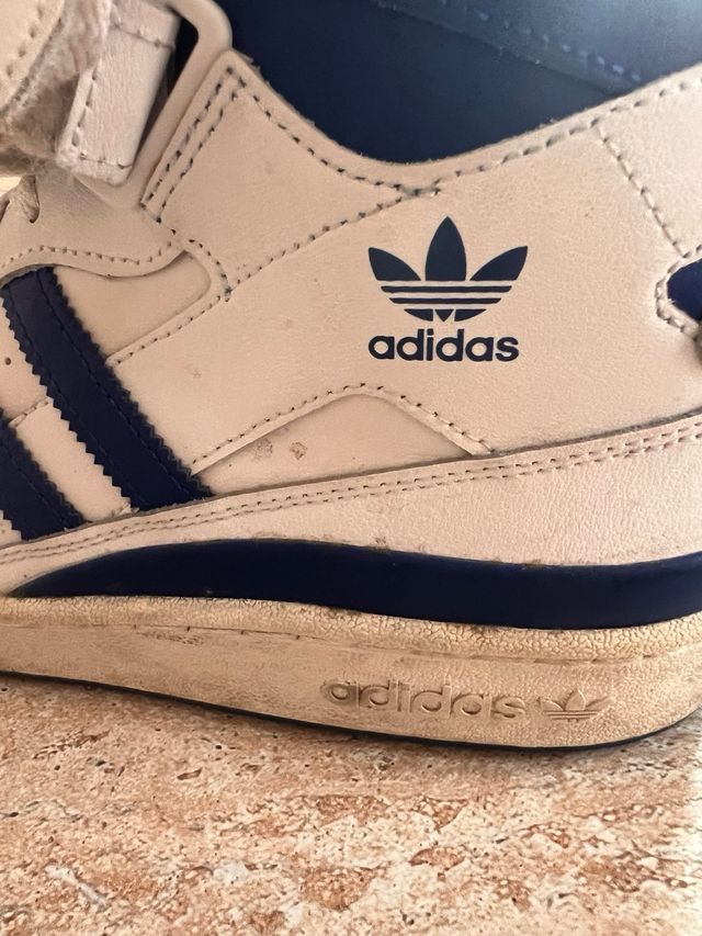 Zapatillas Adidas altas blancas y azules