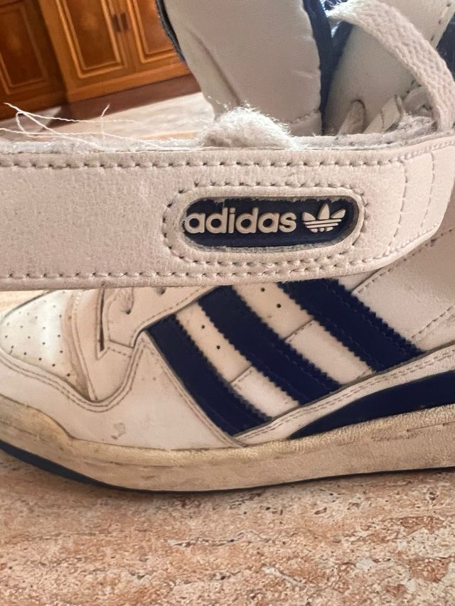 Zapatillas Adidas altas blancas y azules