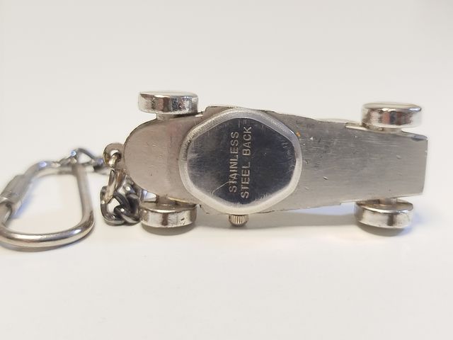 Llavero F1 antiguo con reloj
