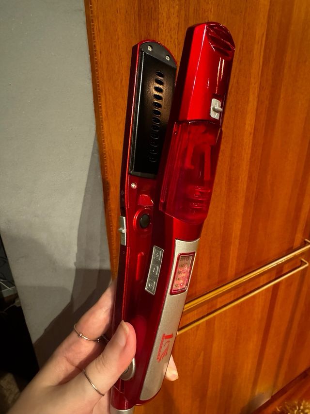 Piastra a vapore lisciante