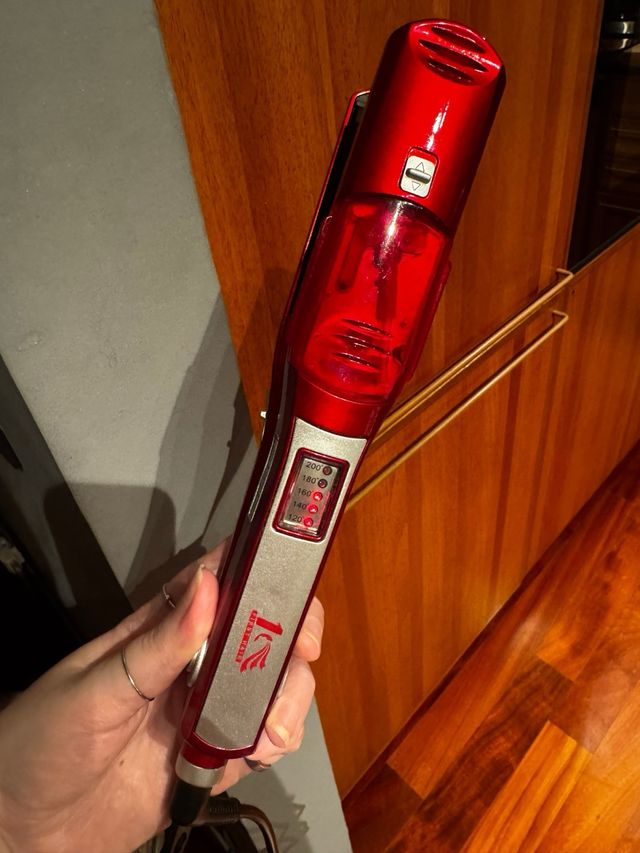 Piastra a vapore lisciante