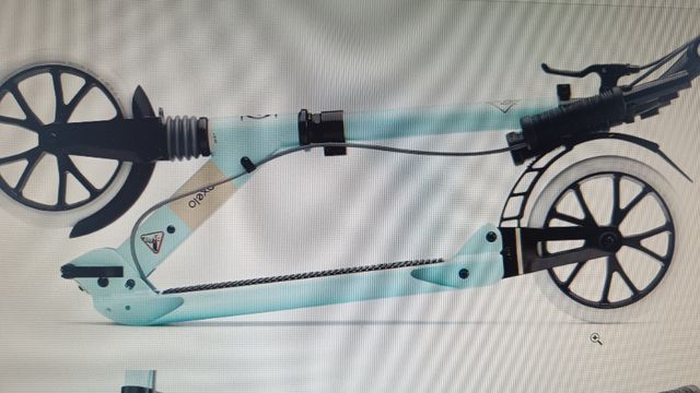 2 Patinetes Oxelo Town 7XL. Una verde y una negro