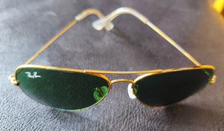 Gafas de sol doradas
