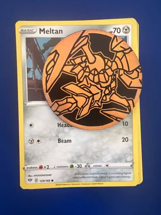 Pokemon de metal y una moneda de kleavor 90 cartas