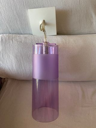 3 lampade Kartell: verde, viola e giallo.