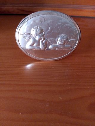 Targhetta sopprammobile in argento.