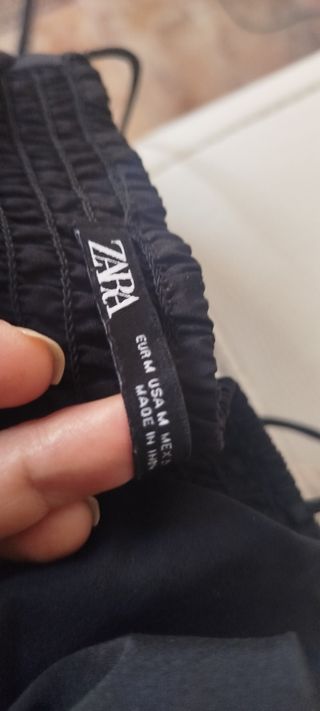 Vestido negro plisado