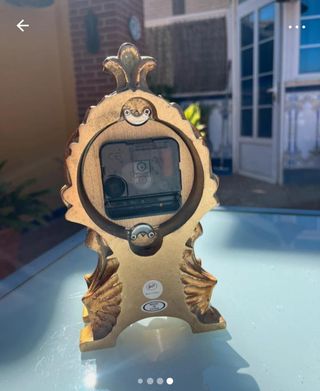 Reloj dorado metal antiguo