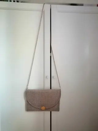 Bolso fiesta Parfois dorado
