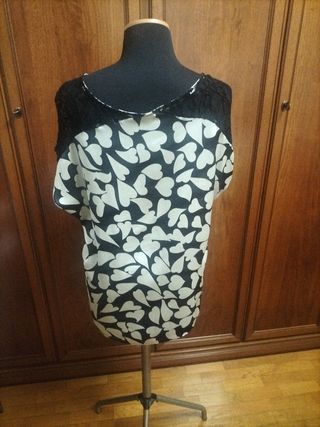 Maglia nera e bianca a cuori