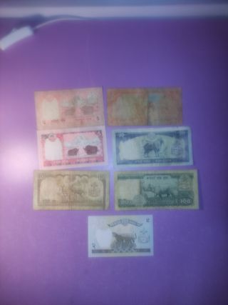 Billetes Nepal antiguos (7 billetes)