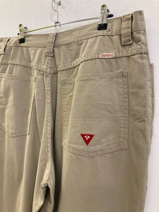 Pantalones beige de la marca GUESS Talla 36