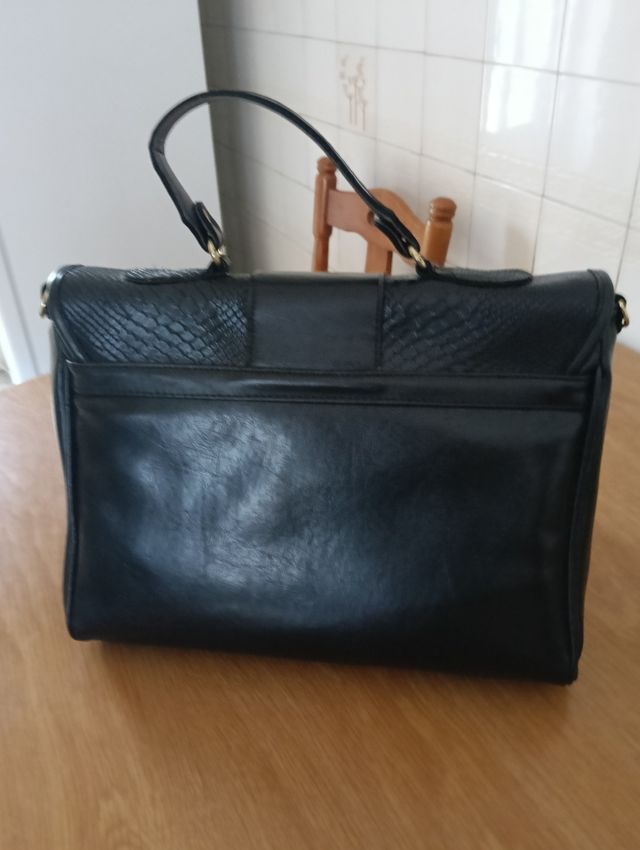 Bolso negro piel serpiente