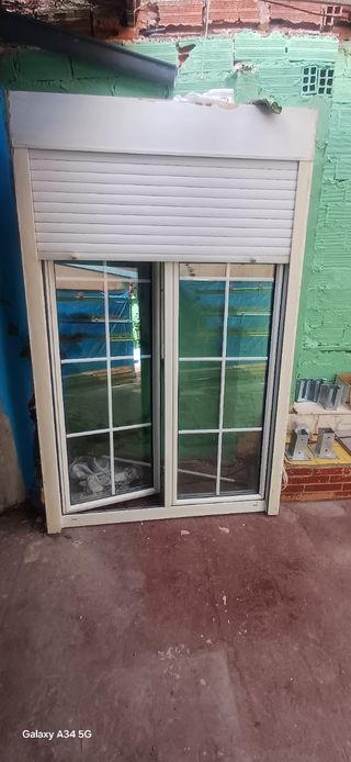 Ventana climalit con persiana vendo o cambió 