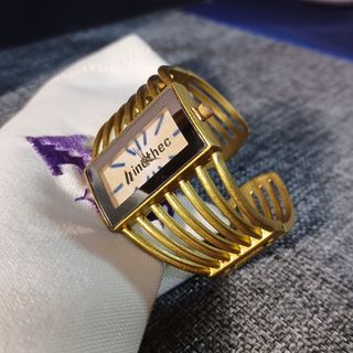 Reloj pulsera dorado mujer