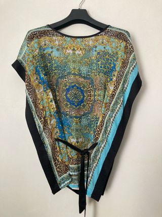 Blusa con cinturón