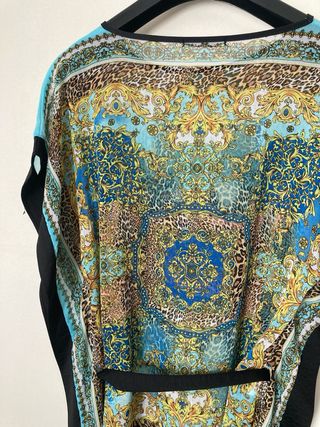 Blusa con cinturón