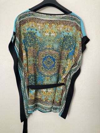 Blusa con cinturón
