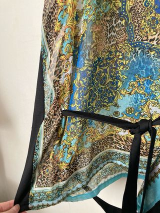 Blusa con cinturón