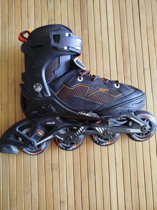 Patines Oxelo línea negro y naranja.