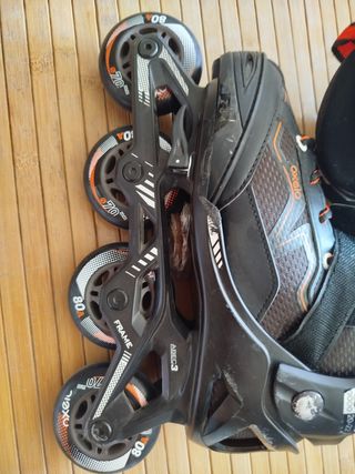 Patines Oxelo línea negro y naranja.