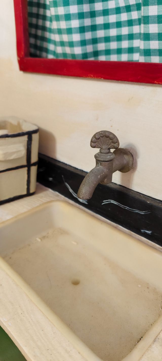 Cocina juguete antigua de madera.