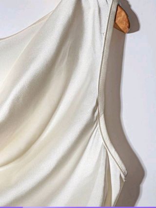 Top beige sin mangas talla M. Nuevo
