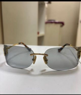 Gafas sol MIU MIU doradas grises