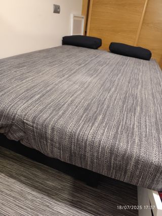 Sofá cama gris - Cómodo y práctico