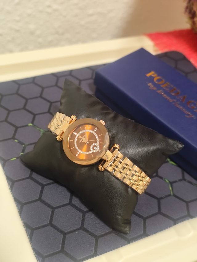 Reloj dorado mujer