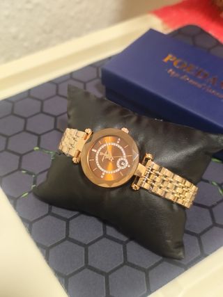 Reloj dorado mujer