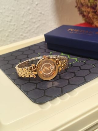 Reloj dorado mujer
