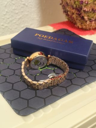 Reloj dorado mujer