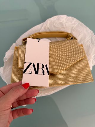 Bolso Zara dorado brillante