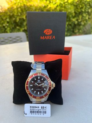 Reloj Marea dorado y plateado