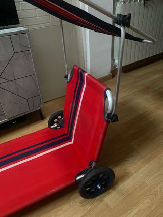 Silla carro jardín plegable roja con techo y cojin
