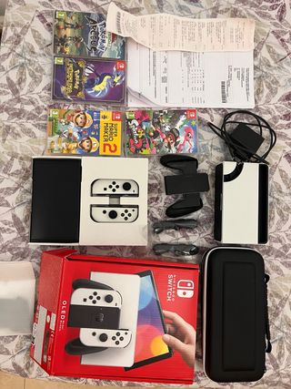 Nintendo Switch OLED Flawless White + giochi 
