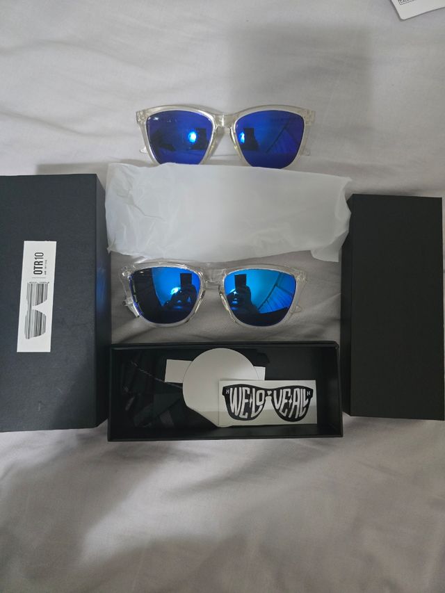 Hawkers - Gafas transparentes azules