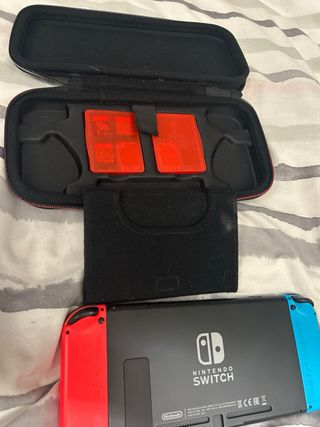 Nintendo Switch + funda+ juegos