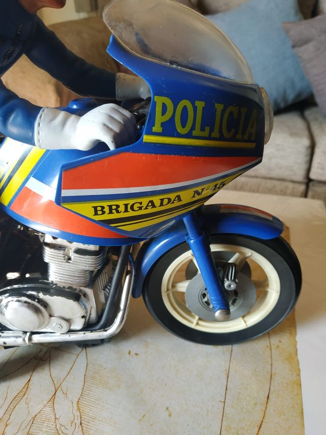 Giocattolo vintage ricco di motociclette della polizia