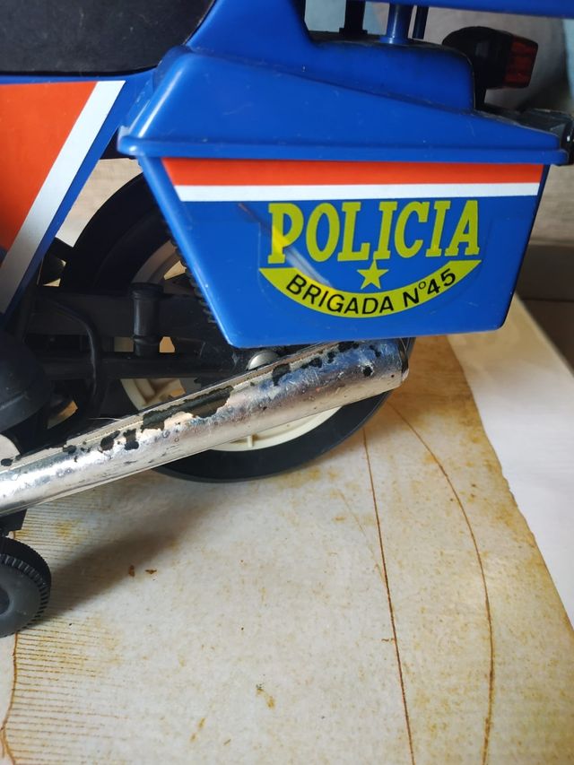 Giocattolo vintage ricco di motociclette della polizia