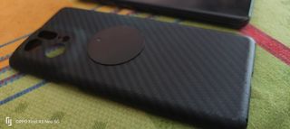 Oppo Find X5 Pro Negro + funda carbono con golpe.