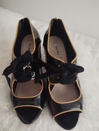 Zapatos Miu Miu ,arreglados suelas y tapas.