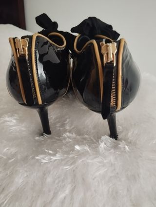 Zapatos Miu Miu ,arreglados suelas y tapas.
