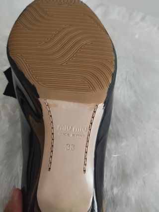 Zapatos Miu Miu ,arreglados suelas y tapas.