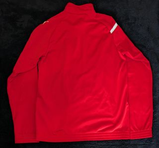 Chaqueta Puma chándal roja y dorada