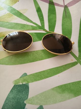 Gafas sol clip-on ovaladas doradas